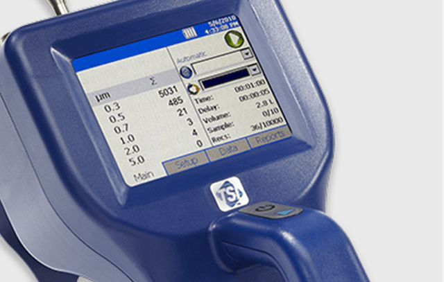 Handheld particle counter measuring air quality for server room compliance